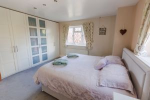 Bedroom One- click for photo gallery